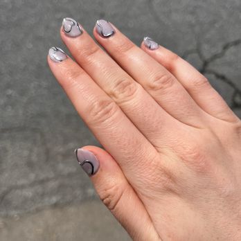 The Moon Nails - Photos taken from different angles to show the silver cat eye base color and chrome outlines. - Nail Salons Near Me - Union City, California The Moon Nails - Photos taken from different angles to show the silver cat eye base color and chrome outlines. - Nail Salons Near Me - Union City, California