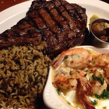 Cattlemens - Bone-in Rib Eye, Mushroom Topper, Rice Pilaf and Add-on Shrimp Scampi - Steakhouses Near Me - Livermore, California