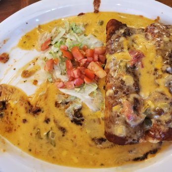 Chuy's - Beef enchilada...I asked for sour cream on the side...ummmm guess they forgot that - Tex-Mex Near Me - Columbus, Ohio