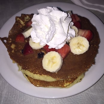 Denny's - The new Buttermilk blueberry pancakes with fresh strawberries and bananas on top....yummy! - American Near Me - Modesto, California