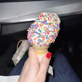 Dari Land - a person holding an ice cream cone with sprinkles - Bakeries Near Me - Riverhead, New York