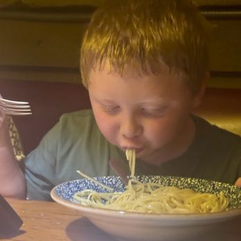 The Garlic - Happy spaghetti and meatballs consumer - Italian Near Me - New Smyrna Beach, Florida The Garlic - Happy spaghetti and meatballs consumer - Italian Near Me - New Smyrna Beach, Florida