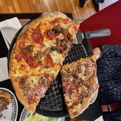 Big Daddy's Pizzeria - Half The Carnivore Pie and half Porky Pie
