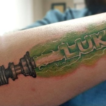 Ink Pagoda - Lukes Lightsaber, day after tattoo - Tattoo Near Me - Fontana, California Ink Pagoda - Lukes Lightsaber, day after tattoo - Tattoo Near Me - Fontana, California