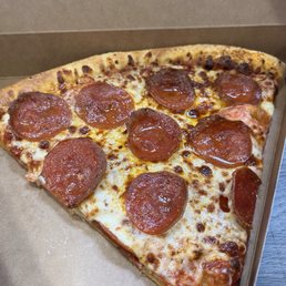 Slice of pizza. So cheap it was almost free. Slice of pizza. So cheap it was almost free.