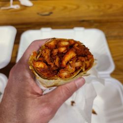 Turmeric Street Style - Chettinad chicken on a Kathi roll.