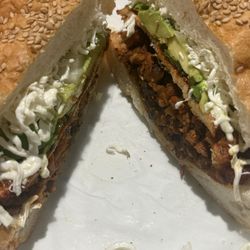 Cemitas Poblanas - Torta de adobada ( meat, Oaxaca cheese, avocado, onions, serrano peppers)