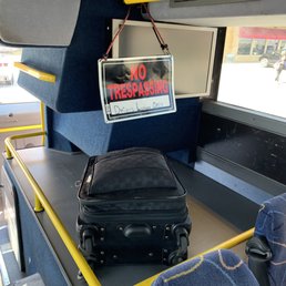 Apparently only the driver is allowed use of the luggage racks despite passengers carry back and pa is on their laps.