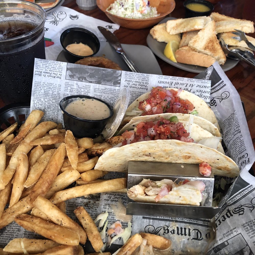 Crabby Joe's Dockside - Fish tacos with fries, coleslaw, side salad, bread comes with crab legs, and corn on the cob - Sports Bars Near Me - Lakeside Marblehead, Ohio Crabby Joe's Dockside - Fish tacos with fries, coleslaw, side salad, bread comes with crab legs, and corn on the cob - Sports Bars Near Me - Lakeside Marblehead, Ohio
