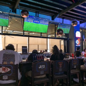 El Mitote Sport Lounge Lubbock - people sitting at a bar - Sports Bars Near Me - Lubbock, Texas El Mitote Sport Lounge Lubbock - people sitting at a bar - Sports Bars Near Me - Lubbock, Texas