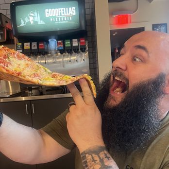 Goodfellas Pizzeria - Short North - The Beard devouring said pizza slice! - Pizza Near Me - Columbus, Ohio Goodfellas Pizzeria - Short North - The Beard devouring said pizza slice! - Pizza Near Me - Columbus, Ohio