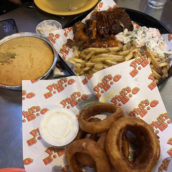 Phil's BBQ - Corn Bread, Colossal Onion Rings (Large), Rib Only (Half) Baby Back Rib Tickler (3 Bones) - Barbeque Near Me - San Diego, California Phil's BBQ - Corn Bread, Colossal Onion Rings (Large), Rib Only (Half) Baby Back Rib Tickler (3 Bones) - Barbeque Near Me - San Diego, California