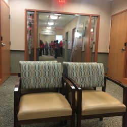 CareMount Medical - Grouping of female secretaries and other staff congregating to take a Heart Day For Women's Health photo