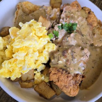 Clara B's Kitchen Table - Smothered Chicken Biscuit comes with Potatoes and Eggs (Scrambled) - Food Trucks Near Me - Belleville, Illinois