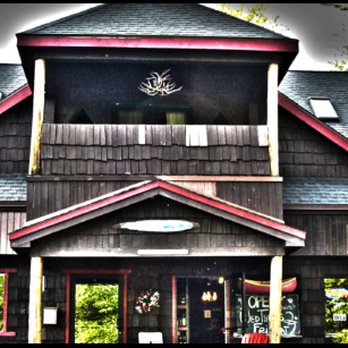 Huddle Bay Wine & Spirits - the front of the building - Beer, Wine & Spirits Near Me - Bolton Landing, New York Huddle Bay Wine & Spirits - the front of the building - Beer, Wine & Spirits Near Me - Bolton Landing, New York