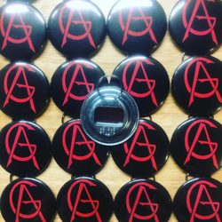 Becka Makes Buttons - Custom 2.25" key-ring bottle opener buttons for Seattle hard rock band, Atrocity Girl.
