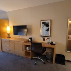 Hyatt Place Miami Airport-East - View of desk, fridge, and closet storage area.