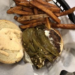 Silvertip Restaurant Bar and Casino - South west Burger fresh 1/2 pound burger cooked to order roasted green chilies, Queso, and our spicy sauce