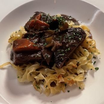 Le Central - Beef Bourguignon over butter and herb egg noodles at Le Central in San Francisco. - French Near Me - San Francisco, California Le Central - Beef Bourguignon over butter and herb egg noodles at Le Central in San Francisco. - French Near Me - San Francisco, California