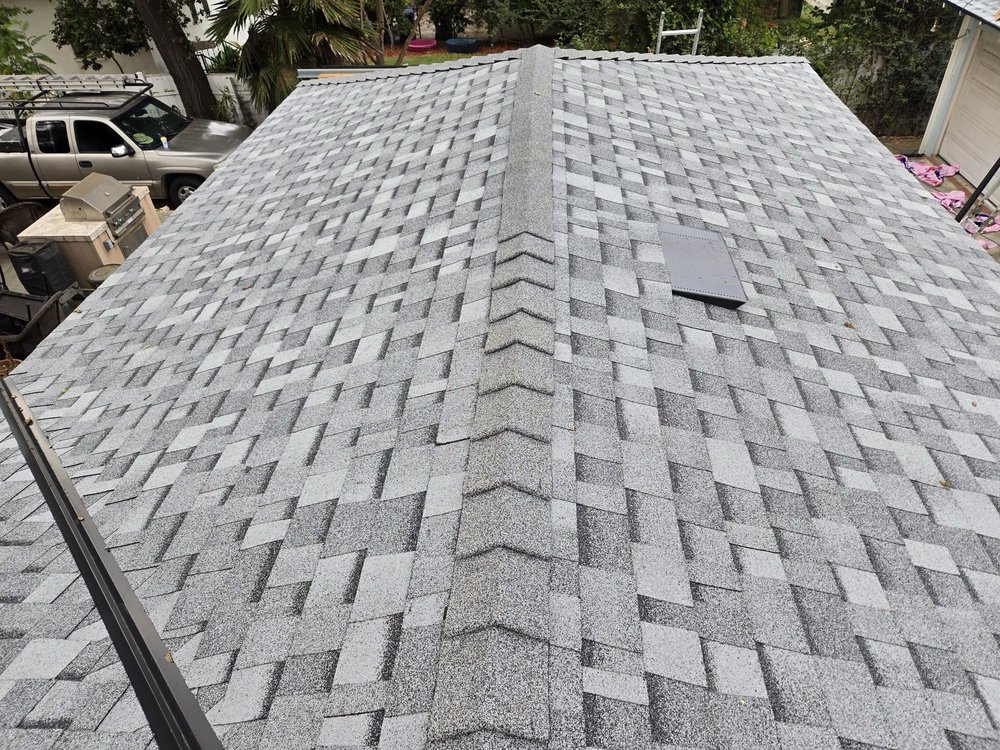 Slide of Musulman Roofing