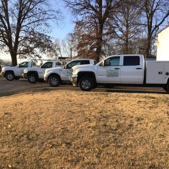 Terry's Cut Trim & Irrigation - trucks parked in a lot - Landscaping Near Me Terry's Cut Trim & Irrigation - trucks parked in a lot - Landscaping Near Me