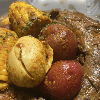 Boil City - Turkey Neck Pack with corn, potatoes, eggs, sausage, rice, and drawn Cajun butter - Slap Yo Momma Good !!! - Seafood Near Me - Beaumont, Texas Boil City - Turkey Neck Pack with corn, potatoes, eggs, sausage, rice, and drawn Cajun butter - Slap Yo Momma Good !!! - Seafood Near Me - Beaumont, Texas