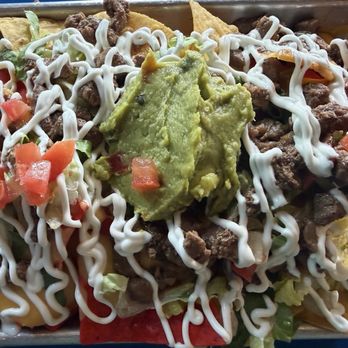 Mexas Tacos - Loaded nachos with carne asada - Tacos Near Me - Orlando, Florida Mexas Tacos - Loaded nachos with carne asada - Tacos Near Me - Orlando, Florida