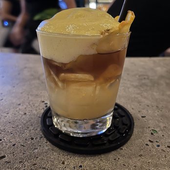 Monkeypod Kitchen - Mai tai with lilikoi foam - New American Near Me - Lahaina, Hawaii Monkeypod Kitchen - Mai tai with lilikoi foam - New American Near Me - Lahaina, Hawaii