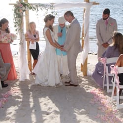 Floral Artistry Studios - Beach was decorated by Floral Artistry along with bouquets MOH is holding