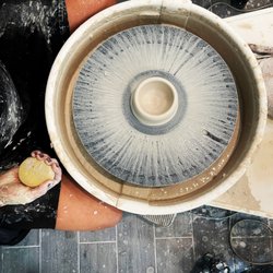 Community Clay - Making pottery in a beginner pottery class.