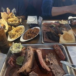 Brisket , Ribs ,  Sausage, Mac and Cheese ,Beans, burger fries and slaw