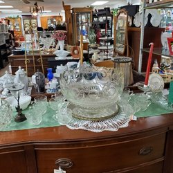 Oliver-Hardin Antiques & More - Beautiful 1930's Mahogany Buffet, with miscellaneous glassware, plus other furniture in the background