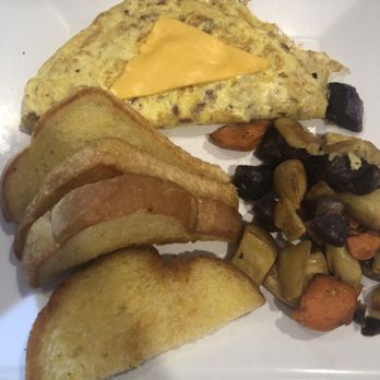 Twisted Citrus - Egg Omelette, SourDough Toast, Roasted Potatoes - Breakfast & Brunch Near Me - North Canton, Ohio Twisted Citrus - Egg Omelette, SourDough Toast, Roasted Potatoes - Breakfast & Brunch Near Me - North Canton, Ohio