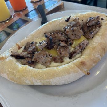 Bramble - 3 Sirens Restaurant Group - Khachapuri - added sausage - Breakfast & Brunch Near Me - Tulsa, Oklahoma Bramble - 3 Sirens Restaurant Group - Khachapuri - added sausage - Breakfast & Brunch Near Me - Tulsa, Oklahoma