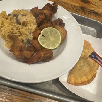 Boricua Soul - Arroz con gandules, fried chicken chunks, and beef empanada - Soul Food Near Me - Durham, North Carolina Boricua Soul - Arroz con gandules, fried chicken chunks, and beef empanada - Soul Food Near Me - Durham, North Carolina