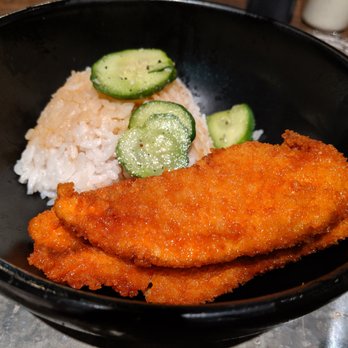 Ponko Chicken - 3-piece Ponko chicken plate (spicy flavor) with Ponko rice (white sticky rice), Ponko pickles, and another side. $9. - Asian Fusion Near Me - Atlanta, Georgia Ponko Chicken - 3-piece Ponko chicken plate (spicy flavor) with Ponko rice (white sticky rice), Ponko pickles, and another side. $9. - Asian Fusion Near Me - Atlanta, Georgia