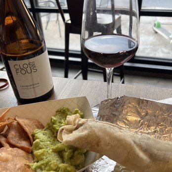 Foolish Things Coffee - Homemade chips and incredibly fresh guacamole, Hatch green chili based slow braised carne burrito, and some absolutely yummy red wine - Coffee & Tea Near Me - Tulsa, Oklahoma
