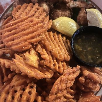 Harold's Corral - Coconut Shrimp Basket with Sweet Potato Fries - Steakhouses Near Me - Cave Creek, Arizona Harold's Corral - Coconut Shrimp Basket with Sweet Potato Fries - Steakhouses Near Me - Cave Creek, Arizona