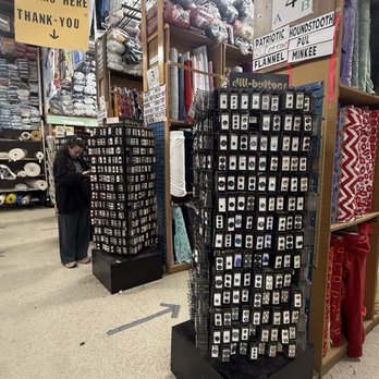 Mill End Fabrics - aisles of fabric with button end caps - Fabric Stores Near Me - Reno, Nevada Mill End Fabrics - aisles of fabric with button end caps - Fabric Stores Near Me - Reno, Nevada