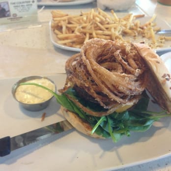 The Counter - 1/3lb on onion bun with cheddar cheese, sautéed mushrooms, avocado, baby spinach, and roasted garlic aioli sauce! - Burgers Near Me - Honolulu, Hawaii
