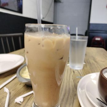 The indian Bistro - Iced chai with fresh spices grated on top. - Indian Near Me - Arcade, New York The indian Bistro - Iced chai with fresh spices grated on top. - Indian Near Me - Arcade, New York