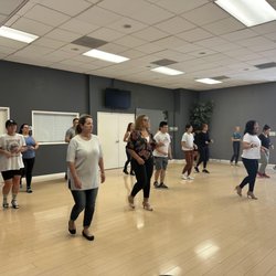 Level Up Dance Studio - Teaching the basic footwork for the Salsa class