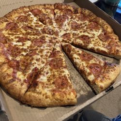 Mobil Sunrise Convenience Store - Pepperoni pizza with extra cheese and buttery crust