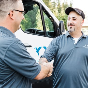 Perspective Solutions - two men shaking hands in front of a van - General Contractors Near Me - North Vancouver, British Columbia Perspective Solutions - two men shaking hands in front of a van - General Contractors Near Me - North Vancouver, British Columbia