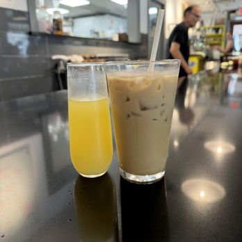 Alexander's Bistro - White chocolate iced latte with oat milk & a mimosa - New American Near Me - Savannah, Georgia