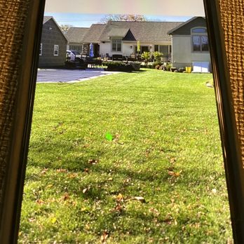 Monmouth Sod - a view of a house through a mirror - Lawn Services Near Me - Hazlet, New Jersey Monmouth Sod - a view of a house through a mirror - Lawn Services Near Me - Hazlet, New Jersey