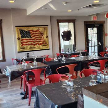 Port Bistro and Pub - tables and chairs in a restaurant - Pubs Near Me - Port Jefferson, New York Port Bistro and Pub - tables and chairs in a restaurant - Pubs Near Me - Port Jefferson, New York