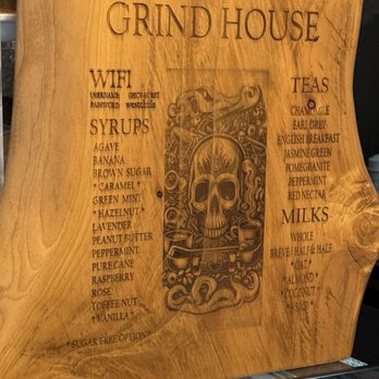 GrindHouse - WiFi and modifiers on a wooden plank next to the register. - Cafes Near Me - Chula Vista, California