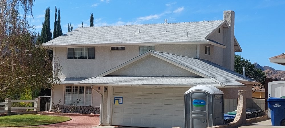 Slide of A. L. Follett Roofing