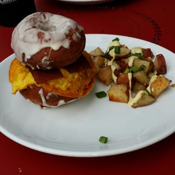 Timeless Coffee - Donut sandwich with bacon & Tofu egg served with potatoes and garlic cheese sauce. - Bakeries Near Me - Oakland, California